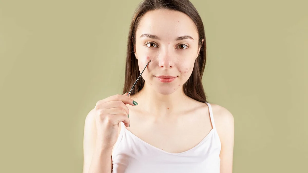 Comment enlever les taches de boutons sur le visage